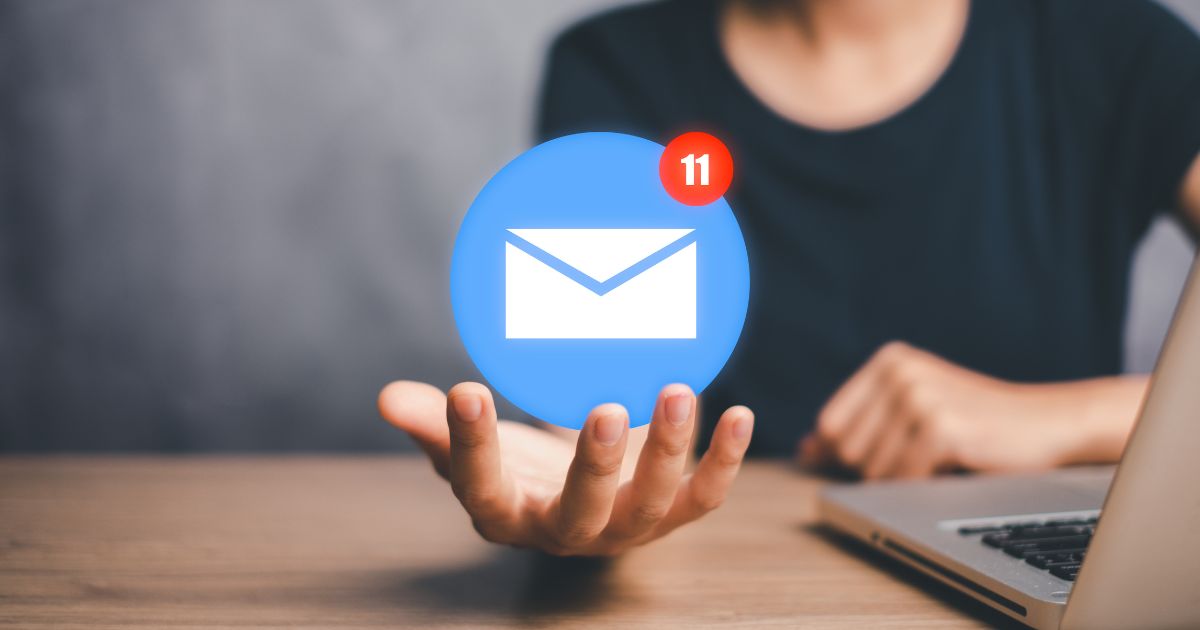 email marketing, holding email logo with notifications